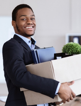 Man Carrying Box of Office Supplies